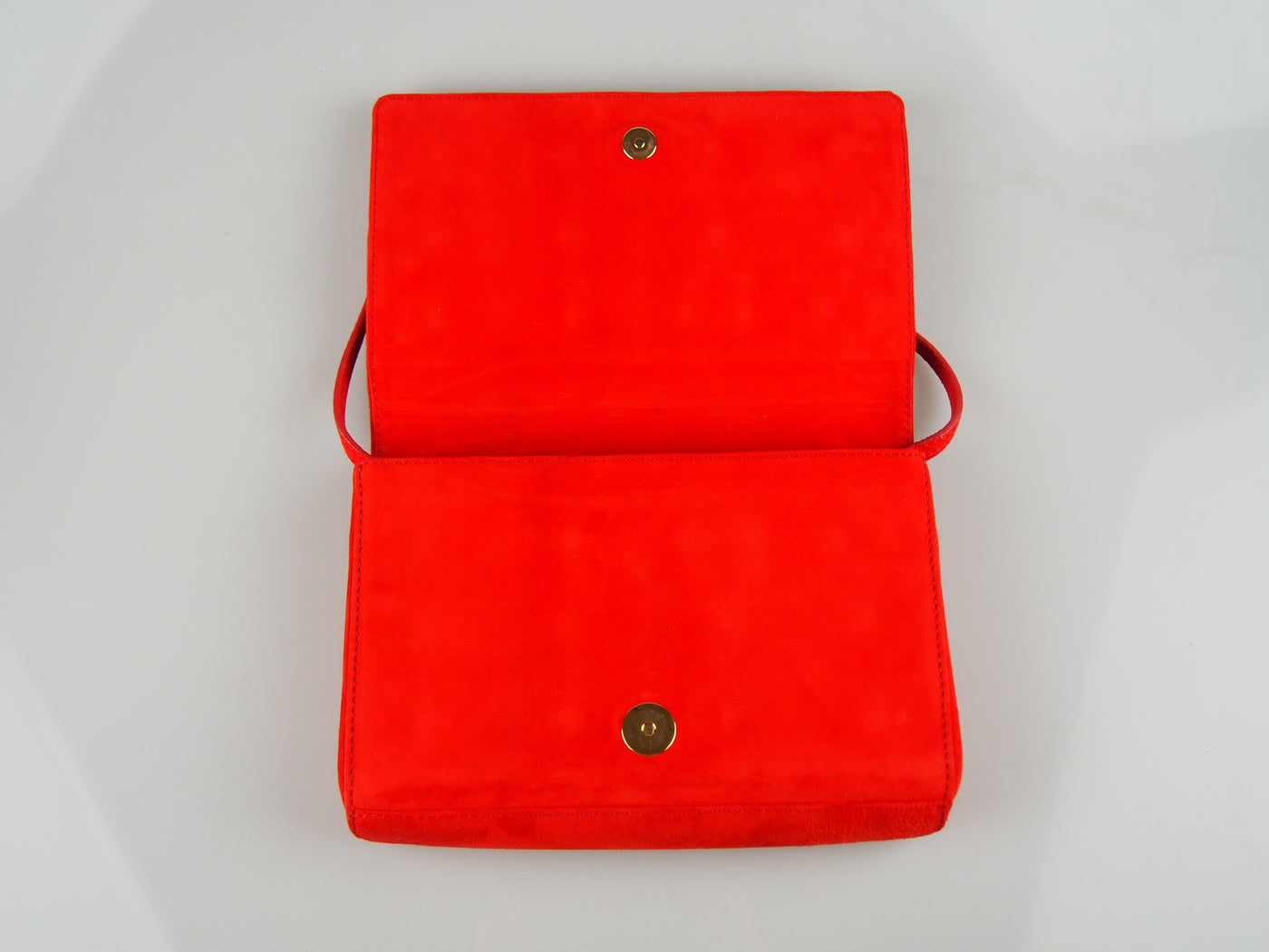Red suede studded clutch