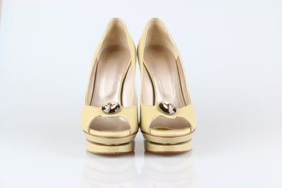 Bejewelled beige patent heels