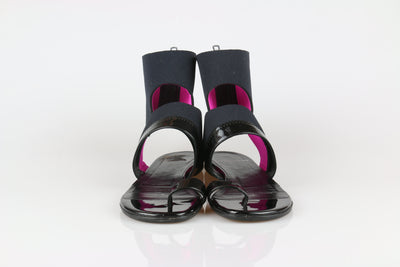 Black and pink cuff sandals