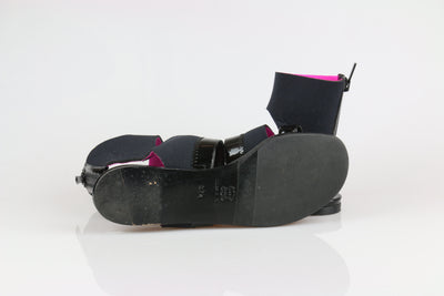 Black and pink cuff sandals