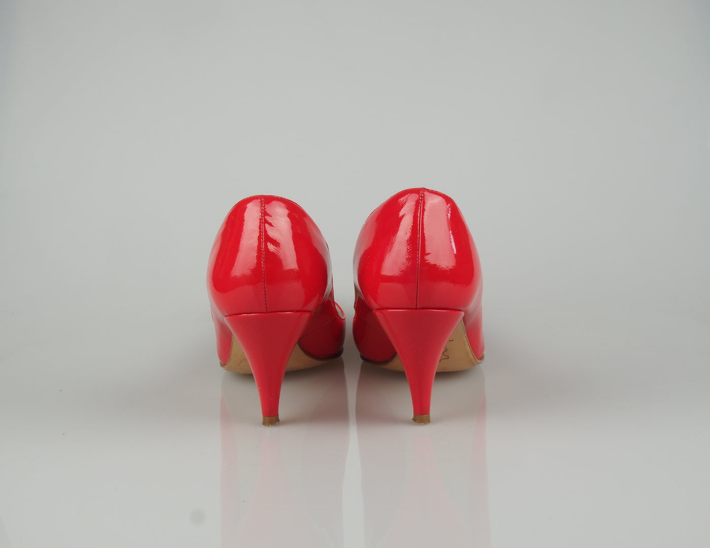 Coral bow heels
