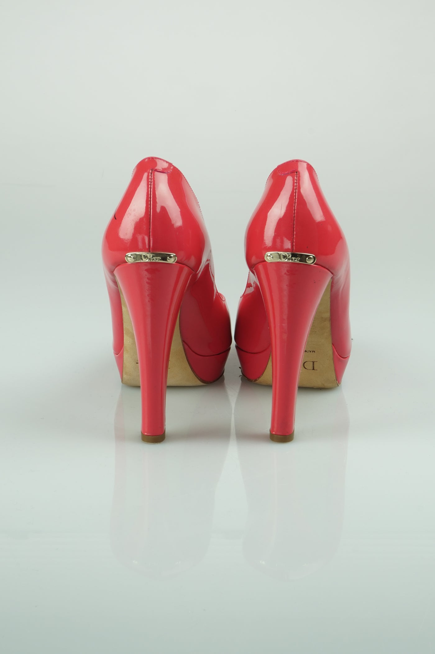 Rosy patent peep toes