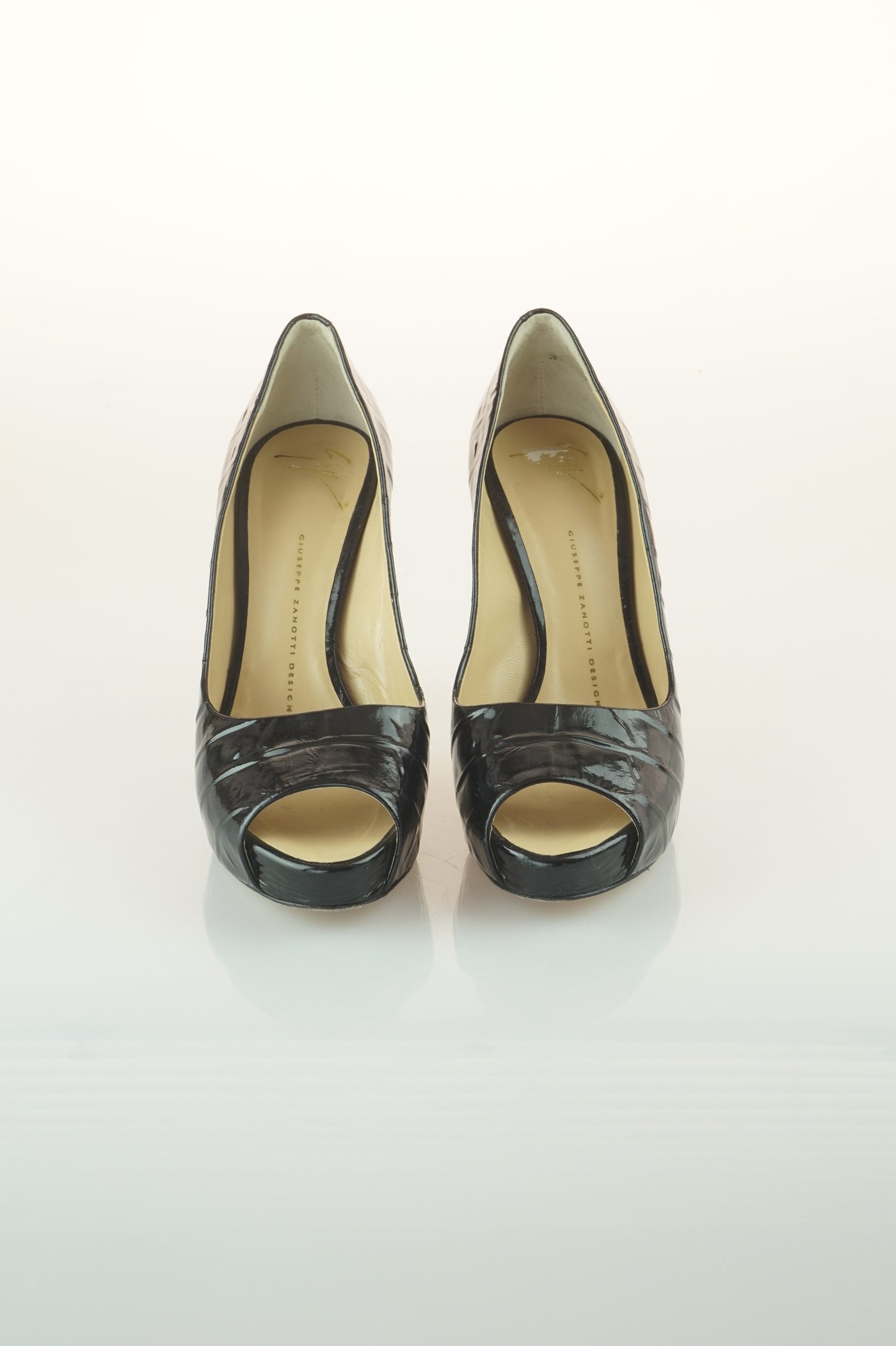 Black patent peep toes