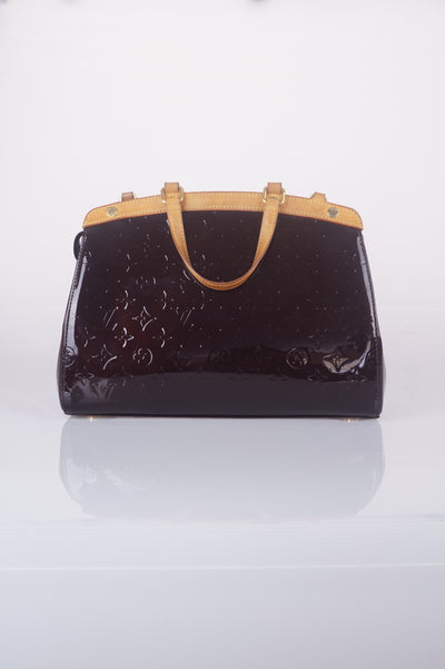 Brea amaranth vernis handbag