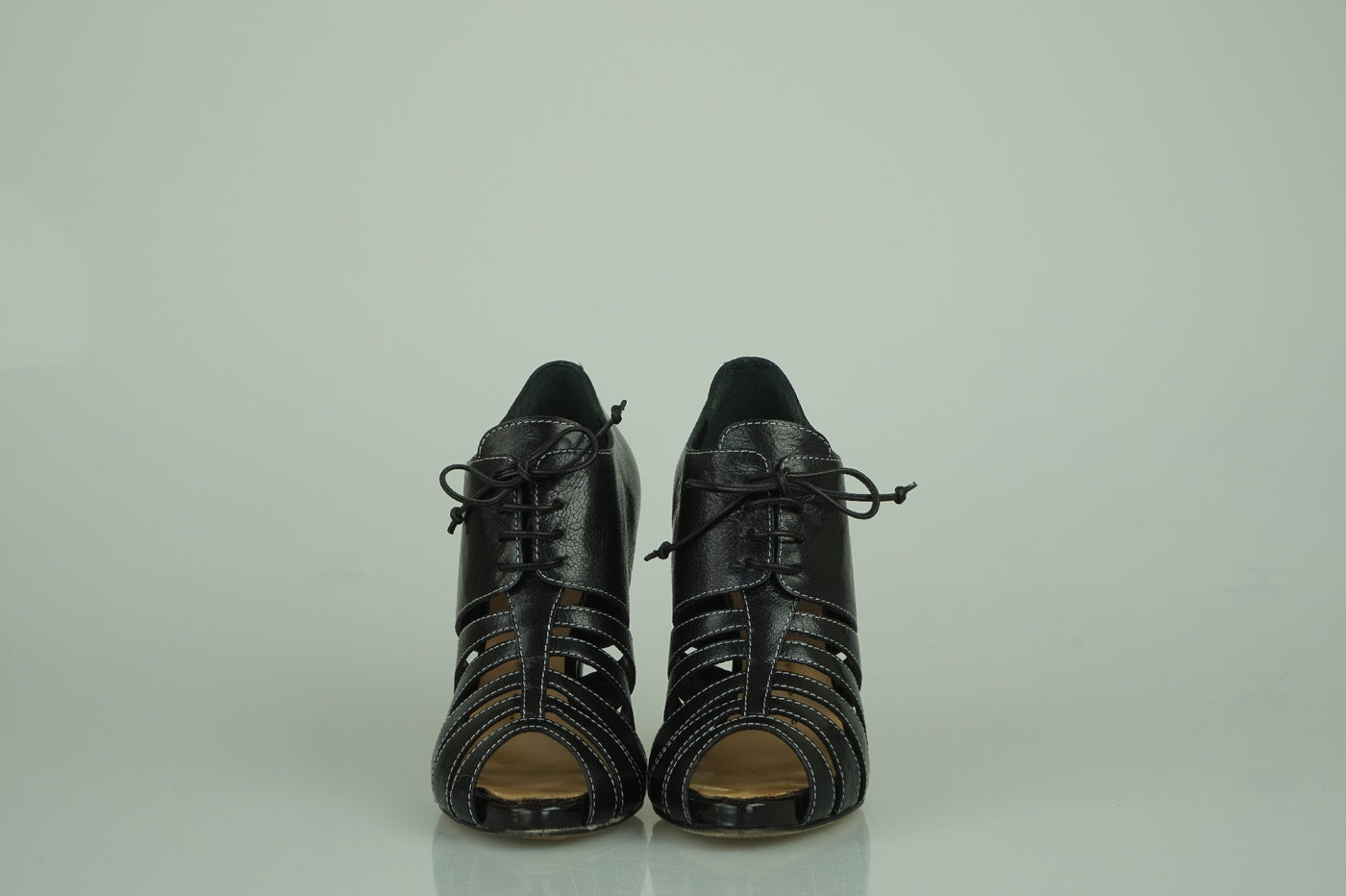 Black skeleton lace-ups