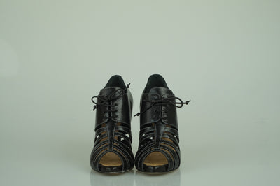 Black skeleton lace-ups